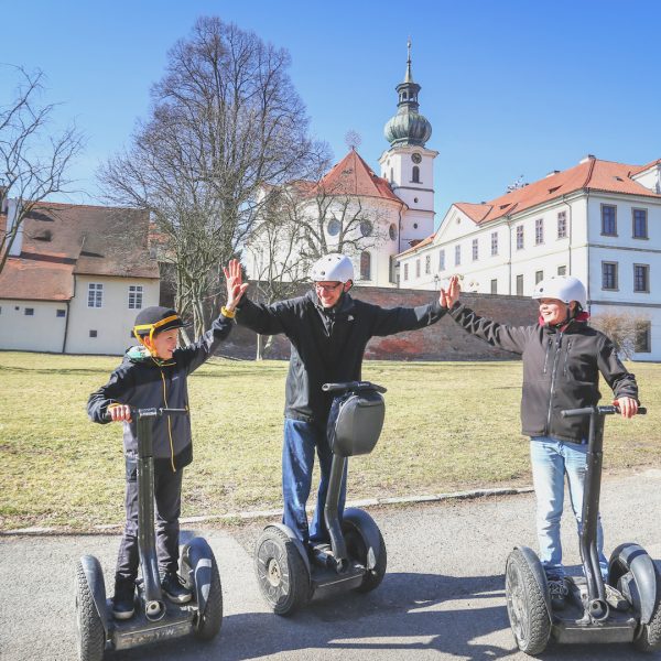 Family on segway infront of Brevnov Monastery in Prague